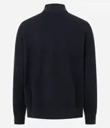 Suéter de punto negro con cuello medio, manga larga y diseño geométrico en relieve. Presenta una delicada aplicación de beads brillantes distribuidos en forma de rombos sobre el frente.