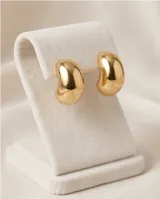Caravanas de acero con baño de oro, con diseño minimalista en forma de gota.