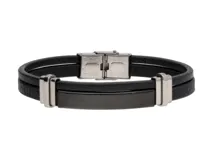 Pulsera de diseño doble compuesta por dos tiras de cuerina negra y una placa central de acero galvanizado en tono oscuro, con cierre de seguridad de acero inoxidable.