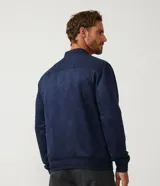 Chaqueta bomber de Marfinno en color tostado, con cierre frontal y cuello de tejido acanalado. Presenta un diseño liso con costuras horizontales y bolsillos funcionales.