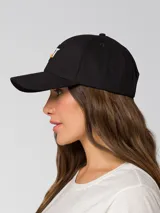 Gorro con visera curva de color negro, con parche de silicona con el logotipo de Caterpillar en el frente.