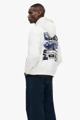 Canguro de algodón con capucha y cordones ajustables, bolsillo frontal tipo canguro, hombros caídos y puños acanalados. Presenta un estampado frontal con el logo de Ford GT.