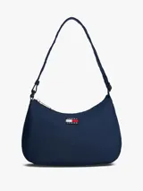 Cartera de hombro tipo baguette de Tommy Jeans, color azul marino, con cierre de cremallera y correa ajustable de tejido trenzado. Presenta el parche distintivo de la marca en la parte frontal.