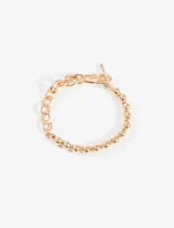 Pulsera dorada con eslabones irregulares y cierre de barra en forma de T.