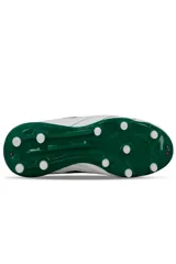 Championes de fútbol Lotto modelo Genova MD para hombre, color azul con detalles en blanco, diseñados con tapones para césped natural y logo de la marca en el lateral.
