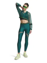 Calza deportiva de alto rendimiento Under Armour, confeccionada en tejido HeatGear ligero y transpirable. Presenta un diseño ajustado con paneles de malla estratégicos para mayor ventilación, cintura elástica con logo de la marca y costuras diseñadas para estilizar la figura.