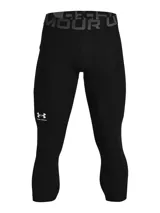 Calza de compresión deportiva Under Armour modelo HeatGear, de largo 3/4, color negro. Presenta cintura elástica ancha con logo de la marca y bolsillo lateral Strength Pocket.