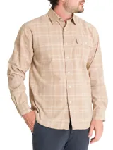 Camisa de manga larga RKF confeccionada en algodón orgánico con textura de cotelé cepillado. Presenta un diseño de cuadros escoceses en tonos beige y arena, cuello camisero, cierre frontal con botones y un bolsillo en el pecho con solapa.