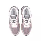 Championes New Balance U2010 de gamuza y malla color lila con detalles en gris y blanco.