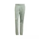 Pantalón de jogging color verde claro con cintura elástica y logo de Adidas bordado en la pierna izquierda.