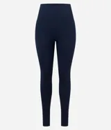 Pantalón legging deportivo de tiro alto, confeccionado en tejido seamless acanalado, con cintura elástica y ajuste ceñido al cuerpo.