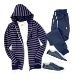 Campera con capucha a rayas horizontales violetas y azul marino, con cierre frontal y bolsillos laterales. Confeccionada en algodón.