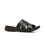 Sandalia plana Usaflex modelo Cecile, de cuero en tonos nude, beige y marfil, con tiras cruzadas y suela baja texturizada.