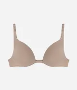 Sostén color nude de microfibra, modelo media taza con copas estructuradas y base reforzada. Cuenta con tirantes ajustables transparentes y cierre posterior.