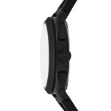 Reloj Fossil Machine para hombre, con caja redonda de acero inoxidable negro, esfera negra con detalles en azul y correa de silicona negra con textura.