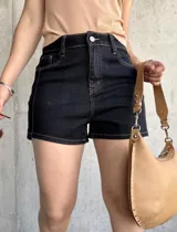 Short de denim azul oscuro, de tiro alto y corte ajustado.