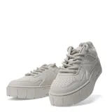 Championes blancos de plataforma con cordones.