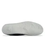 Zapatillas Reef negras de lona con cordones blancos y suela blanca.