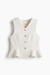 Chaleco de sarga de mezcla de algodón con escote de pico, botonadura sencilla y diseño con peplum acampanado en la parte inferior. Prenda forrada.