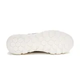 Championes Caterpillar modelo Hex Lite Vent, color azul marino con suela blanca y detalles en amarillo.