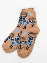 Medias color beige con diseño de llamas azules y cactus, con interior de sherpa blanco.