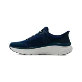 Championes deportivos Skechers Slip-ins Relaxed Fit modelo D'Lux Walker, color azul marino con suela blanca y amortiguación alta.
