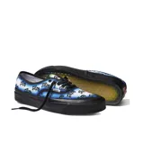 Championes Vans unisex modelo Alva Skates Authentic 44 DX, con estampado de graffitis en tonos azules y blancos, suela negra de goma y forro OrthoLite.