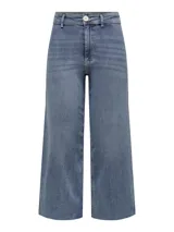 Jean de corte wide leg y tiro alto, con diseño cropped y terminación deshilachada en el ruedo. Confeccionado en denim elástico con cinco bolsillos y cierre frontal con botón metálico.