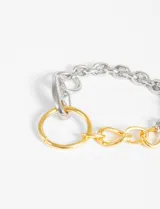 Pulsera de eslabones irregulares plateados y dorados.