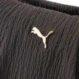 Bolso tipo bucket de la marca Puma, color negro con textura arrugada y logo metálico dorado en la parte frontal. Cuenta con correa ajustable para el hombro y cierre superior.