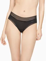 Bombacha hipster negra de modal con spandex, cintura ancha con malla transparente y logo de Calvin Klein en el lado izquierdo.