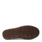 Zapatos urbanos Caterpillar modelo Apa Cush, color marrón, confeccionados en cuero con detalles en gamuza en el talón. Presentan cierre con cordones, suela de goma en tono beige y logo de la marca en el lateral.