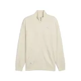 Campera Puma de cuello alto con cierre frontal completo, confeccionada en tejido texturizado tipo waffle color arena. Presenta logo de la marca bordado en el pecho y bolsillos laterales.