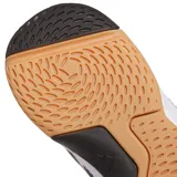 Championes deportivos Adidas Ligra 8 para interior, color blanco con las icónicas tres tiras laterales en negro. Presentan una estructura de malla transpirable con refuerzos sintéticos, cuello acolchado negro y suela de goma color caramelo diseñada para ofrecer tracción en superficies indoor.