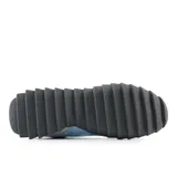 Championes New Balance modelo URC30EA, color celeste con detalles en blanco y gris.