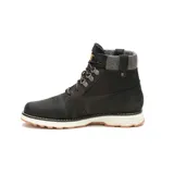 Bota de caña media Caterpillar modelo Charli, confeccionada en cuero nobuk texturizado color negro. Presenta cuello acolchado en tejido gris, cierre mediante cordones con ganchos metálicos y suela de goma con entresuela blanca contrastante.