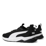 Championes urbanos Puma modelo Anzarun 2.0 Formstrip, color negro con detalles en blanco. Presentan una capellada de malla transpirable, suela de goma con entresuela de espuma para mayor amortiguación y el icónico diseño Formstrip en los laterales.