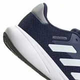 Championes de running Adidas modelo Response Runner, color azul oscuro con las tres tiras características en blanco y entresuela blanca. Confeccionados en malla transpirable para mayor comodidad.