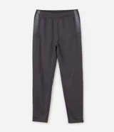 Pantalón deportivo de corte ajustado con cintura elástica, cordón de ajuste, bolsillos con cremallera, franjas laterales en contraste y cremalleras en los bajos.