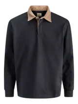 Polo de manga larga con corte holgado, confeccionado en algodón. Presenta un cuello de pana en color tostado, abertura frontal parcial con botones y puños acanalados.