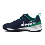 Championes de tenis Diadora modelo Blushield Torneo 2 AG, color azul marino con detalles en verde, blanco y gris. Presentan el logo de la marca en los laterales y tecnología Blushield para mayor amortiguación y estabilidad.