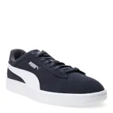 Championes urbanos Puma modelo Smash 3.0, color negro con la icónica franja lateral en blanco. Confeccionados en gamuza, cuentan con cierre de cordones y suela de goma blanca.
