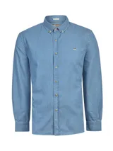 Camisa de manga larga confeccionada en algodón orgánico con textura tipo chambray. Presenta cuello con botones, cierre frontal abotonado y el icónico logo de pato bordado en el pecho.