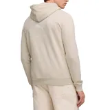 Canguro Puma de color verde petróleo, con capucha ajustable con cordones, bolsillo frontal tipo canguro y logo de la marca estampado en el pecho. Presenta puños con detalle de rayas en contraste.