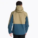 Campera impermeable tipo hardshell de Merrell, con diseño bicolor en tonos beige y azul. Cuenta con capucha ajustable, cierre frontal completo, bolsillos con cremalleras impermeables en contraste naranja y ventilación en las axilas.