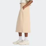 Falda midi color beige de pana elástica, de corte recto y tiro alto, con cierre frontal de cremallera y botones.