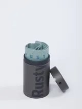 Boxer blanco con elástico negro en la cintura con la marca Rusty en color celeste.