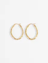 Aros dorados de acero con forma orgánica.