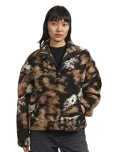 Campera tipo pullover de Carhartt WIP confeccionada en fleece texturado con estampado animal print abstracto en tonos marrón, negro y blanco. Presenta cuello alto con cierre frontal de botones a presión, bolsillo tipo canguro y detalles en tafeta de nylon.