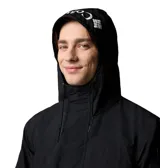 Campera cortaviento Columbia modelo Challenger Windbreak Omni-Shield, color negro con el texto "PACKABLE" impreso en blanco. Es resistente a la lluvia y manchas, cuenta con media cremallera central, capucha ajustable y bolsillo canguro.